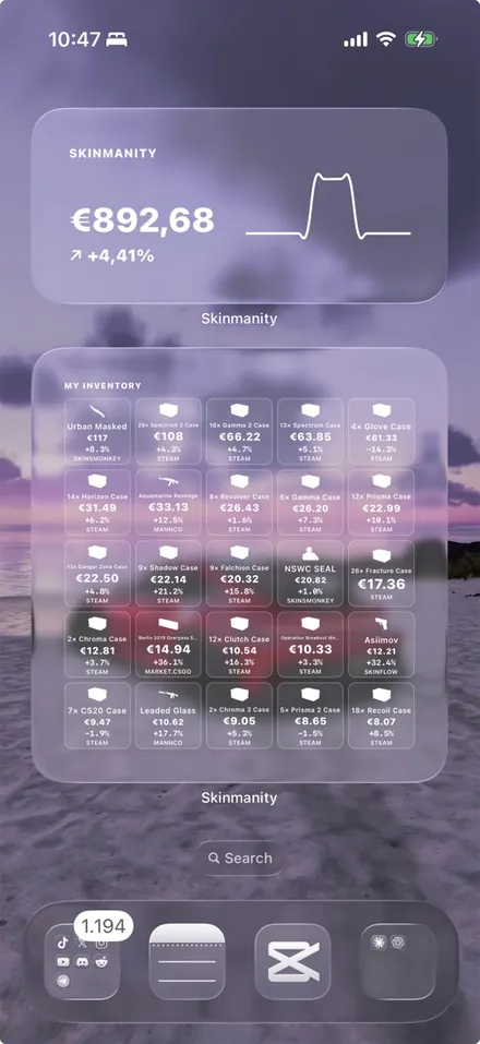 Skinmanity widgets over a purple sunset wallpaper